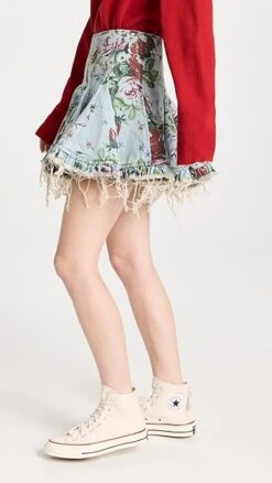 Molly Goddard Floral Printed Denim Flared Mini Skirt 11 Molly Goddard Floral Printed Denim Flared Mini Skirt -Agolde Store mgodd3000627474 1668808926316 2 0. UX357 QL90