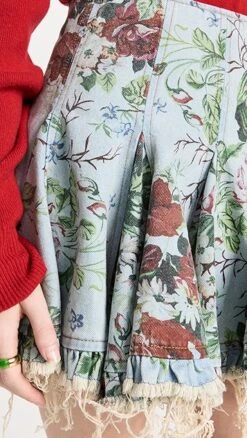 Molly Goddard Floral Printed Denim Flared Mini Skirt 13 Molly Goddard Floral Printed Denim Flared Mini Skirt -Agolde Store mgodd3000627474 1668808926947 2 0. UX357 QL90