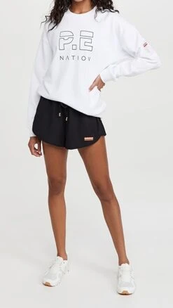 P.E NATION Ramp Run Shorts 11 P.E NATION Ramp Run Shorts -Agolde Store penat303221b002 1626272129689 2 0. UX357 QL90